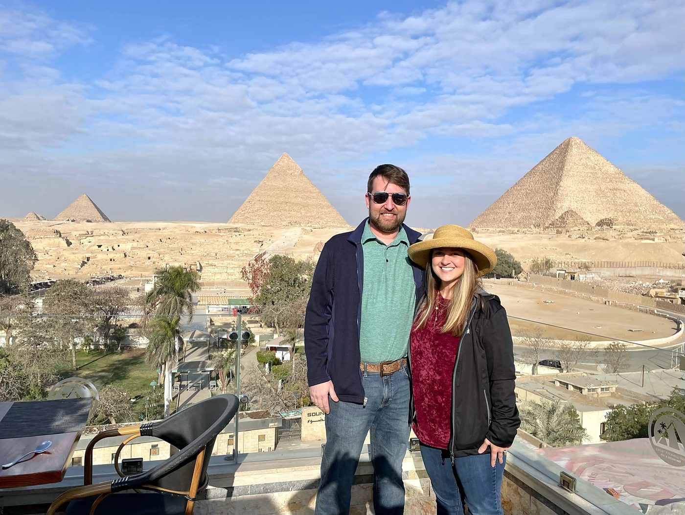 Eric and Allie with the pyramids of Giza behind them