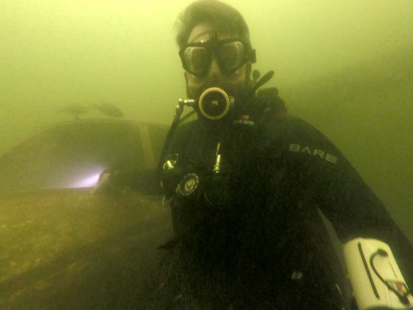 Eric beside the sunken Cessna cockpit